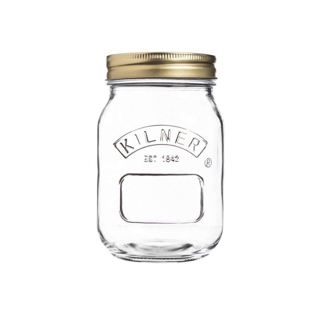 Kilner konserveringsburk i glas på 0,5 liter med guldfärgat metallock, perfekt för sylt och inläggningar.