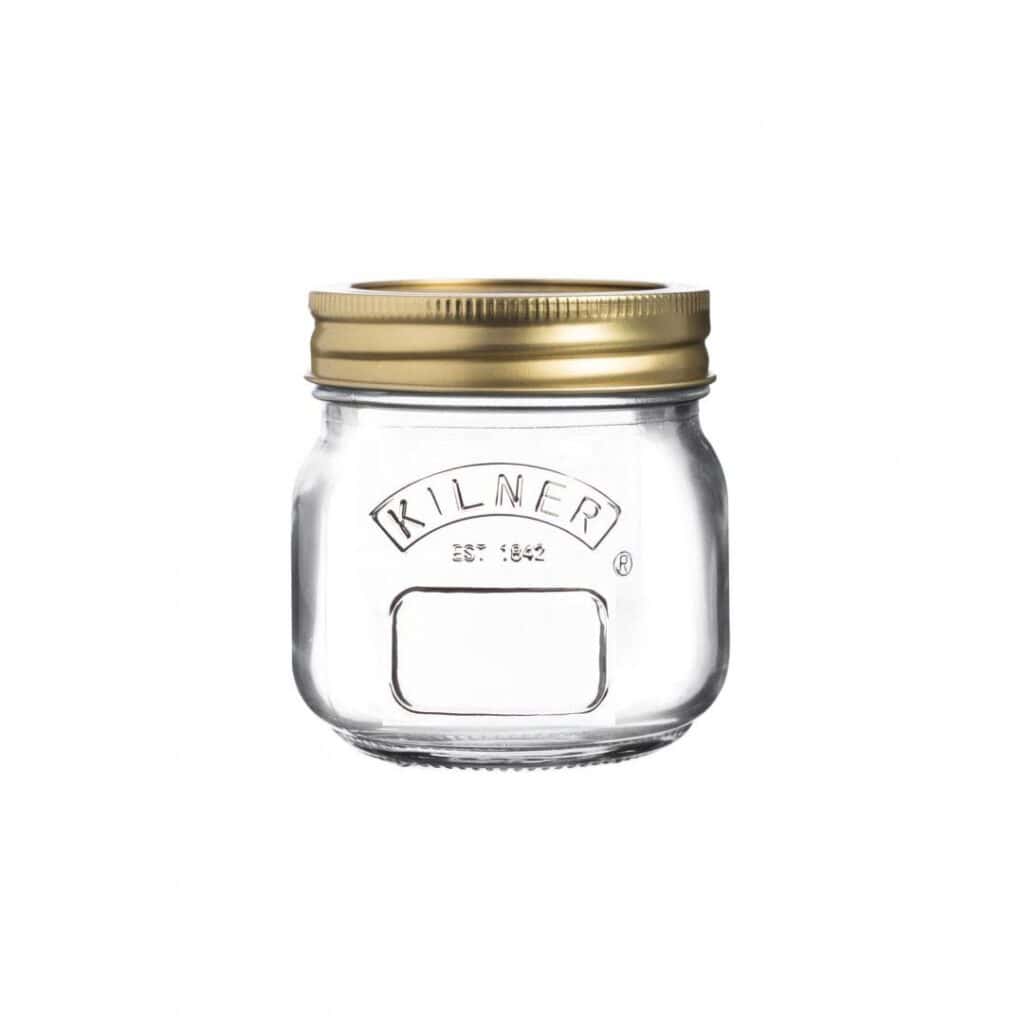 Kilner konserveringsburk 0,25 liter i glas med guldfärgat lock, perfekt för förvaring av sylter och marmelader.