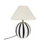 Lampfot ALBA från Strömshaga med en rund, svartvit randig glasfot och en beige lampskärm Hedvig. Elegant och tidlös design med tvinnad textilkabel.
